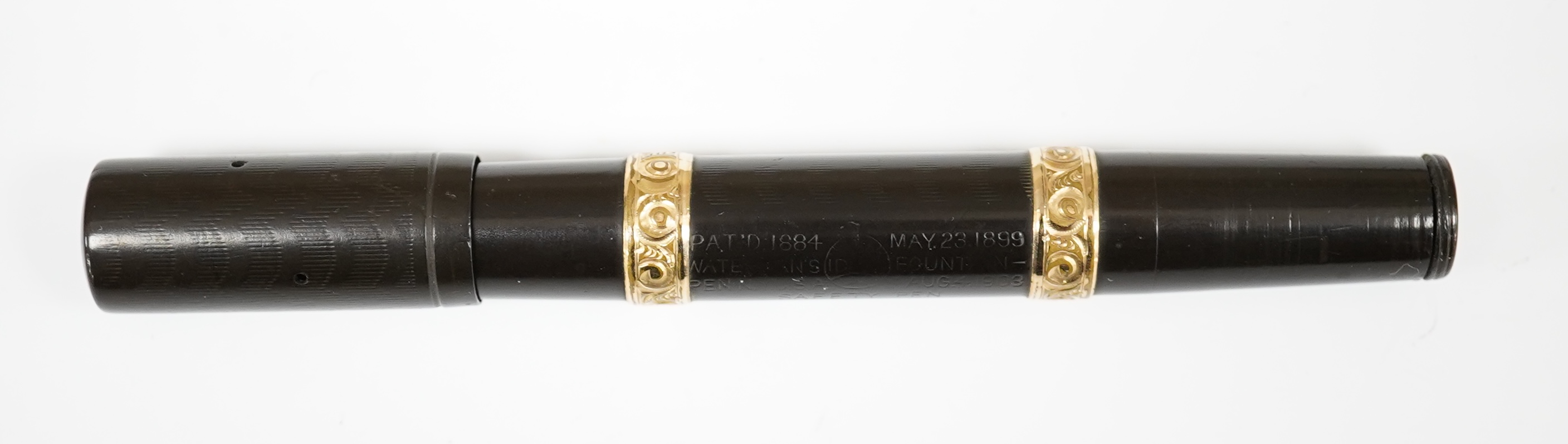 A Waterman 15vs safety black fountain pen with gold filled barrel bands and 14ct. Waterman gold nib